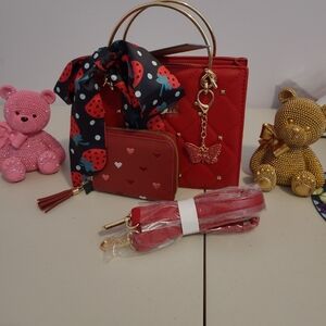 Badgley Mischka Quilted Red Handbag with Gold Hardware and Butterfly Charm